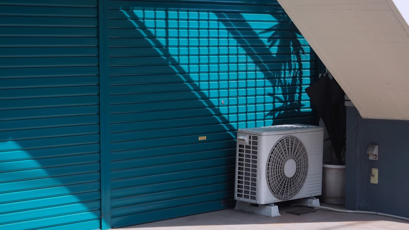 Clean outdoor HVAC equipment in a residential exterior setting